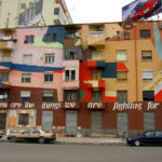 Tirana, Albania painted buildings throughout the city with bright designs to increase residents' sense of belonging and hope for the city's future. Photo by Joonas Lyytinen.